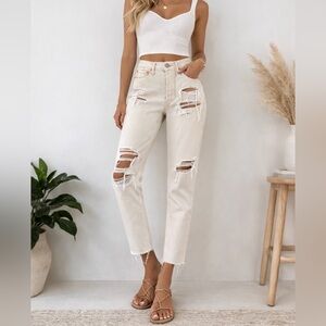 Free People Distressed Straight Leg Button Fly Jeans.